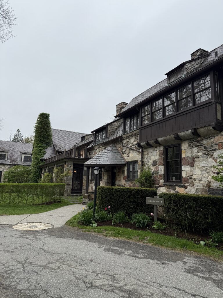 Cozy fireside lounge at Troutbeck, a historic Hudson Valley estate perfect for Fall & Winter New England Getaways.