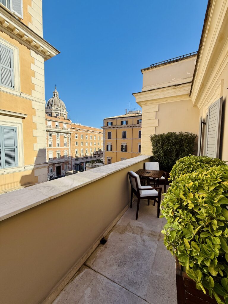 Morning view over Rome from a private balcony near the Spanish Steps during a personalized luxury stay