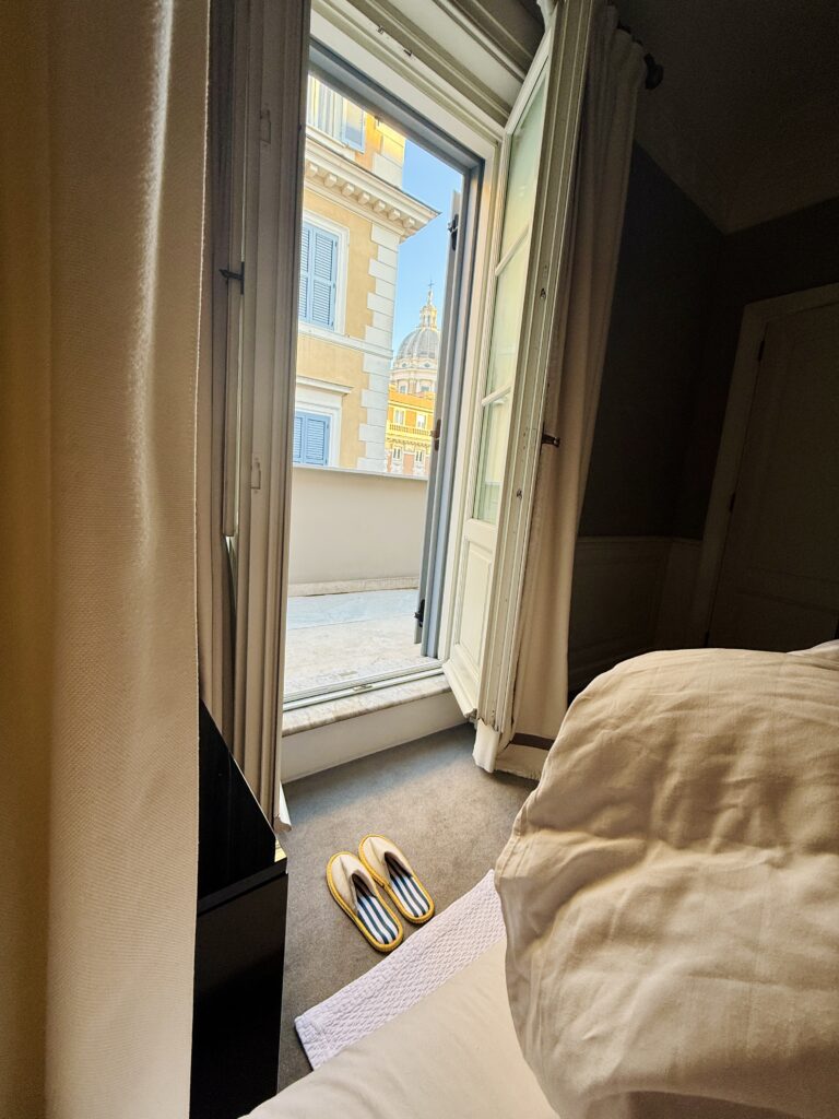 View of the Ponte Vecchio from a luxury hotel set along the Arno River in Florence.”