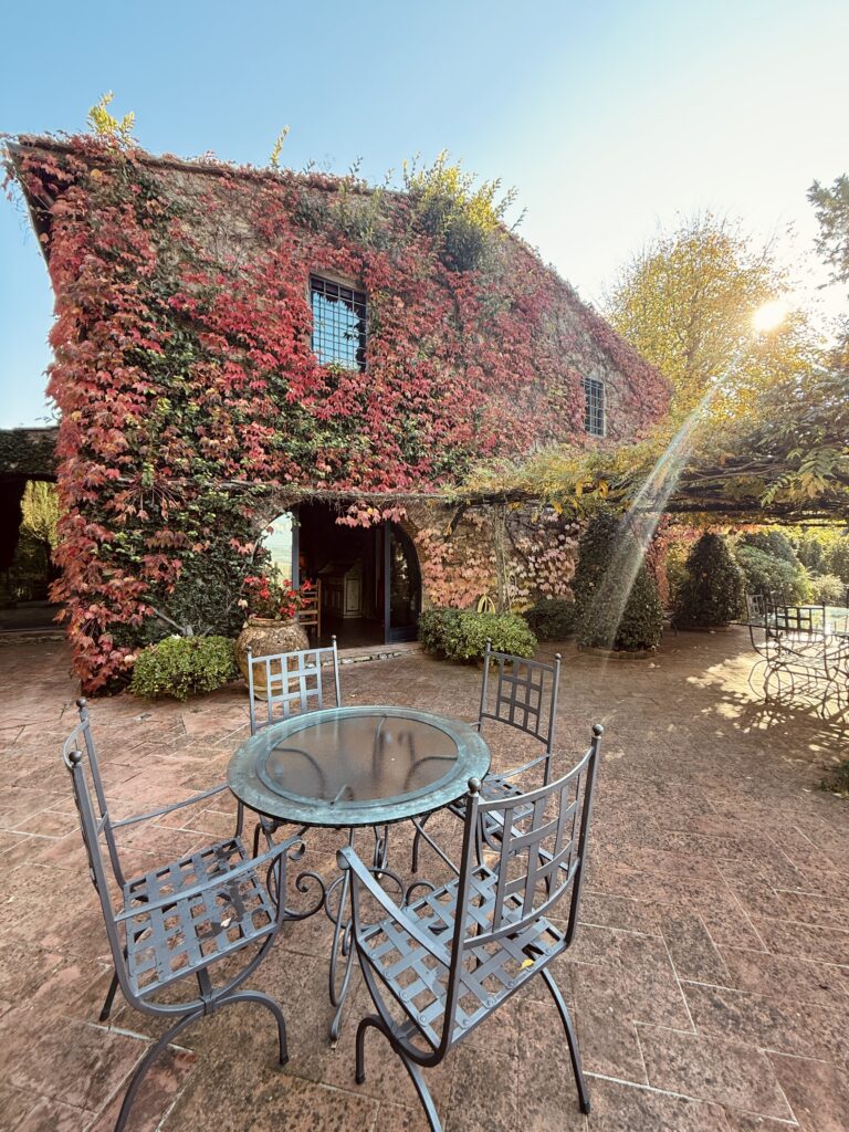 Rustic dinner setting at a countryside osteria in Chianti featuring authentic Tuscan cuisine.