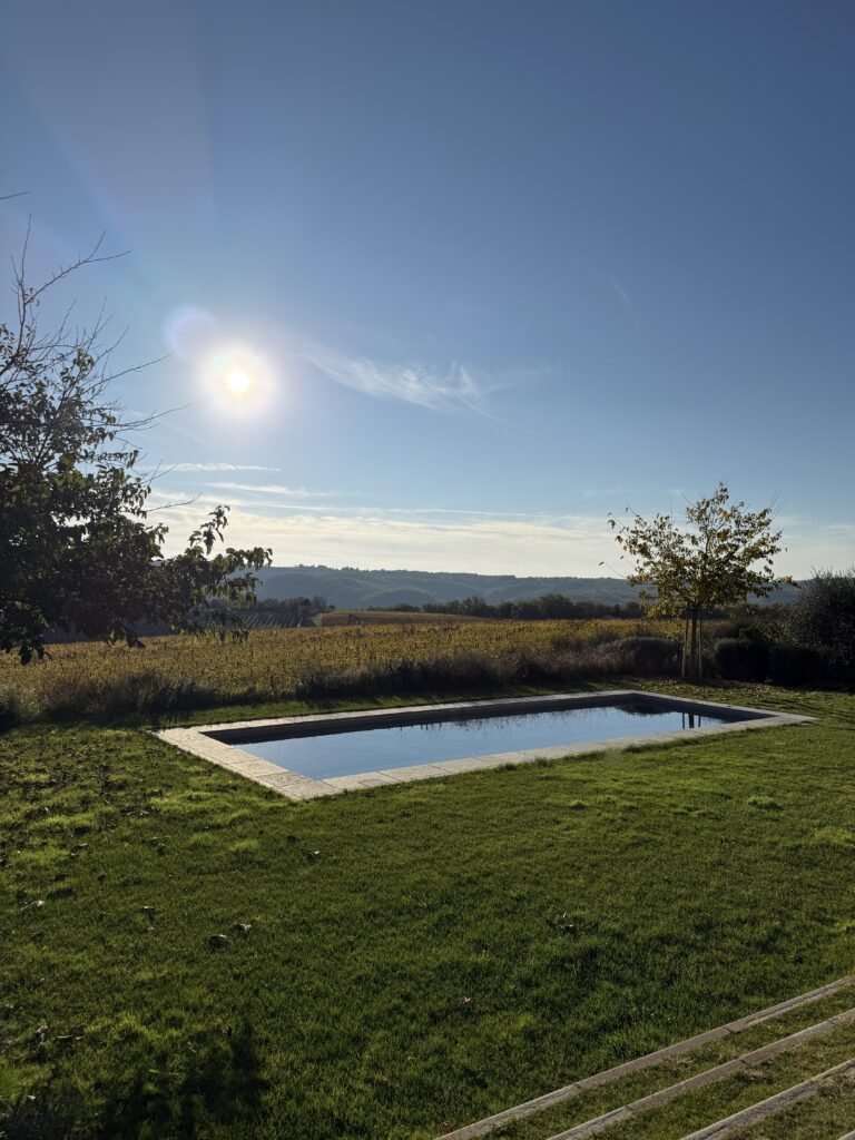 Rolling Tuscan hills viewed from a private villa during a peaceful countryside escape